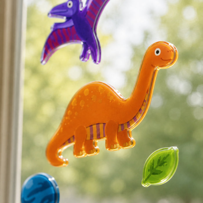 TPR WINDOW STICKER DINOSAUR & PLANET